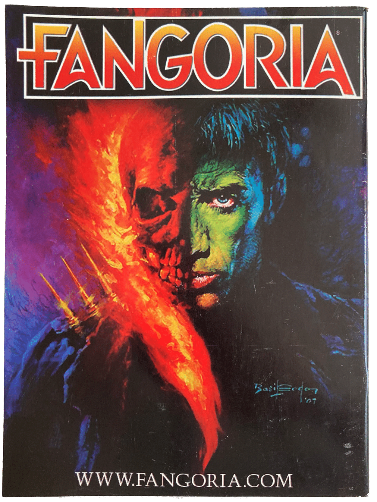Fangoria Magazine #310 cover featuring a fiery skull face merging with a green-tinted man's face and dark background.