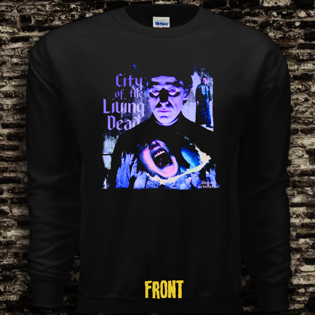 Black long-sleeve shirt with graphic design and text 'City of the Living Dead' on a brick wall background.