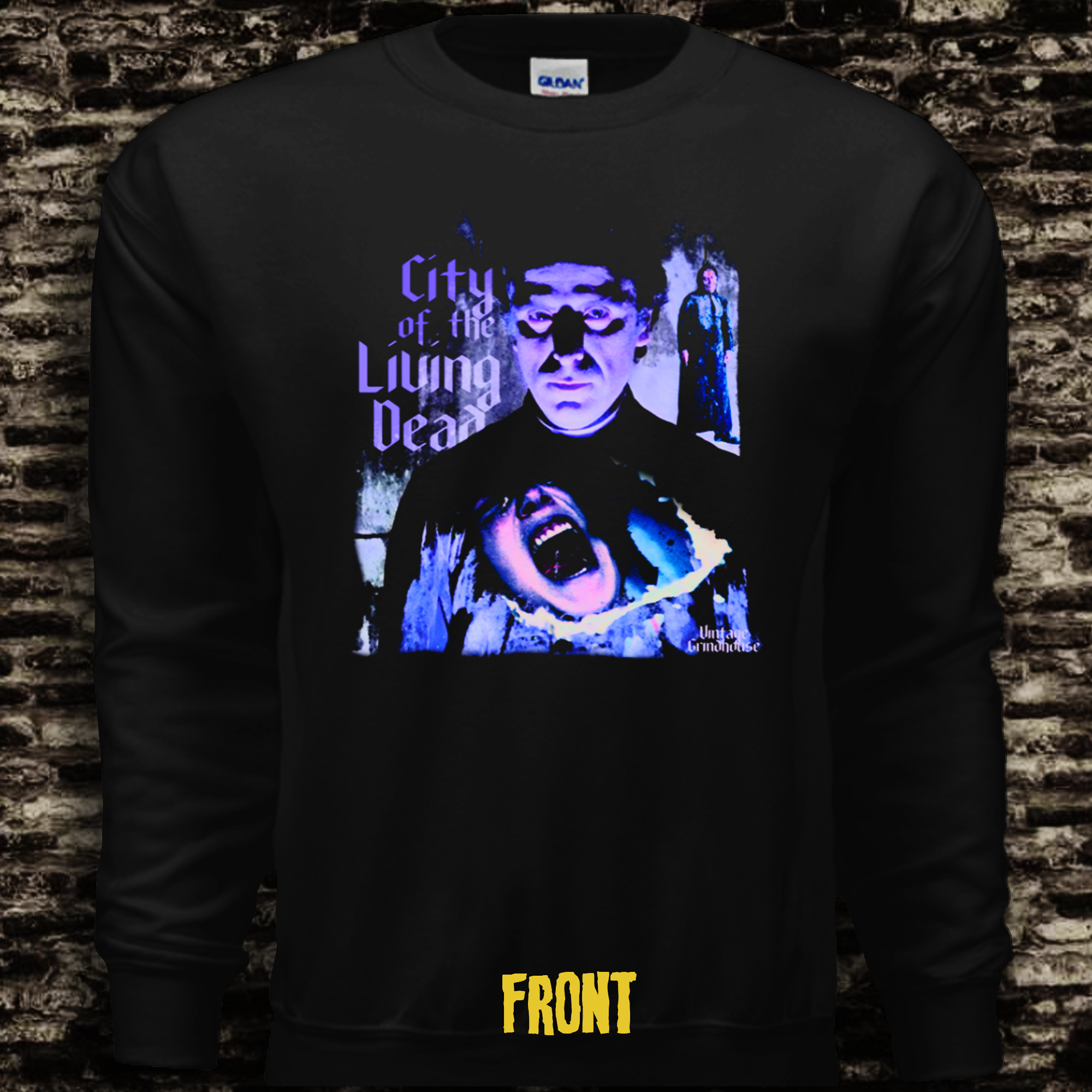 Black long-sleeve shirt with graphic design and text 'City of the Living Dead' on a brick wall background.