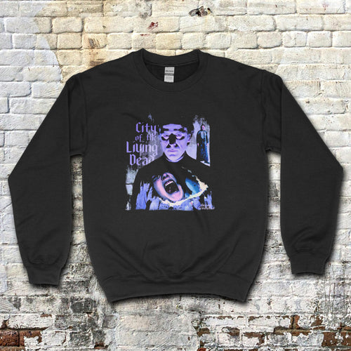 City of the Living Dead sweatshirt featuring eerie purple horror graphic with shadowy figure and screaming face on black fabric