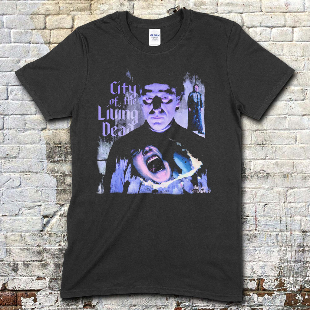 Black t-shirt featuring a blue-toned graphic of a man with a screaming face and City of the Living Dead text on front