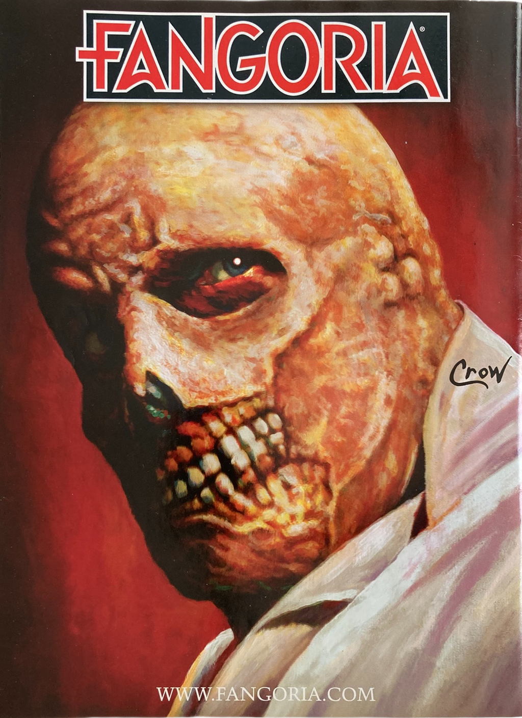 Fangoria Magazine #314 cover featuring a grotesque vintage grindhouse horror face with textured skin and a dark background