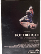Fangoria Magazine #54 cover featuring Poltergeist II poster with a child holding a toy phone in a dark scene
