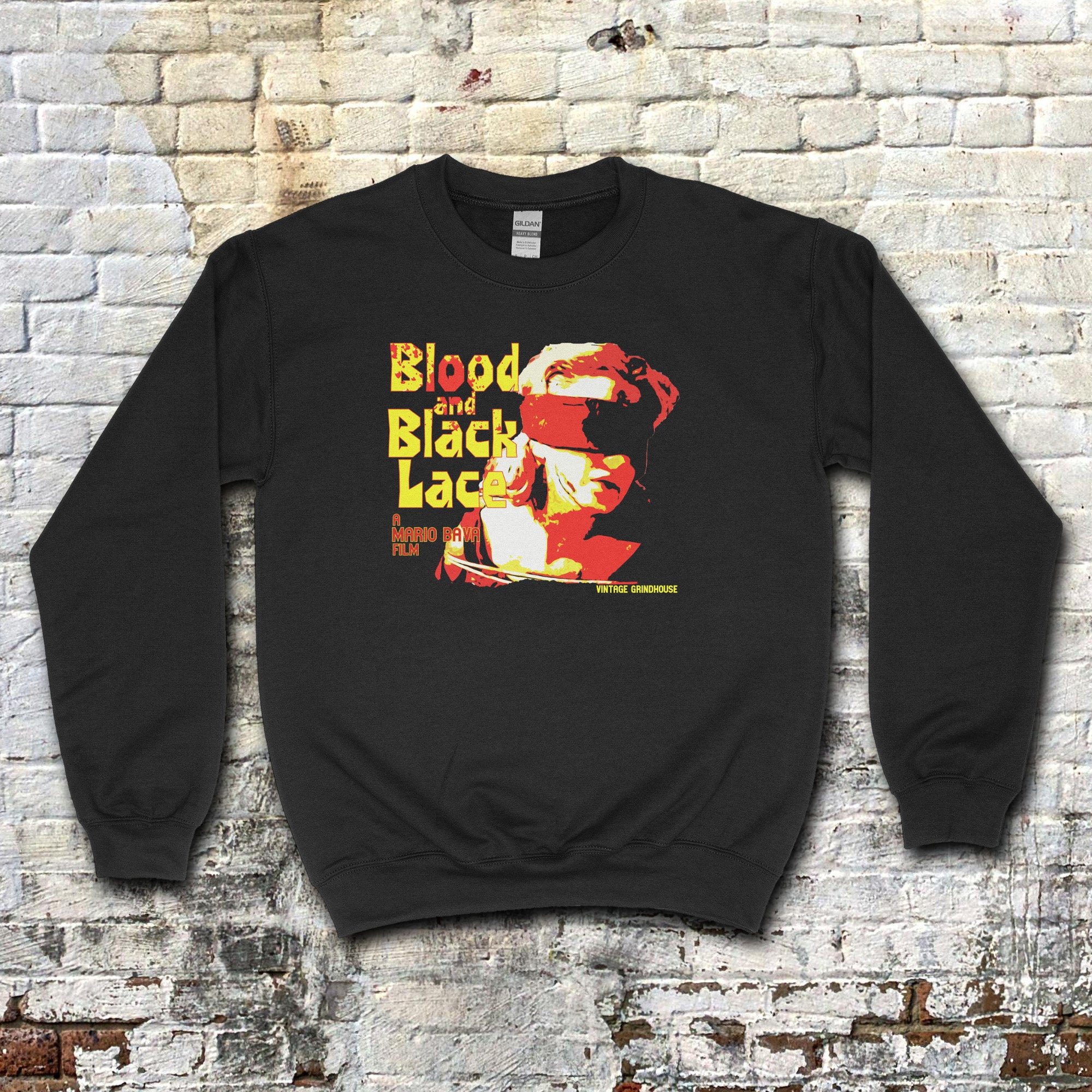Blood and Black Lace sweatshirt featuring bold red and yellow graphic with vintage horror film design on black fabric