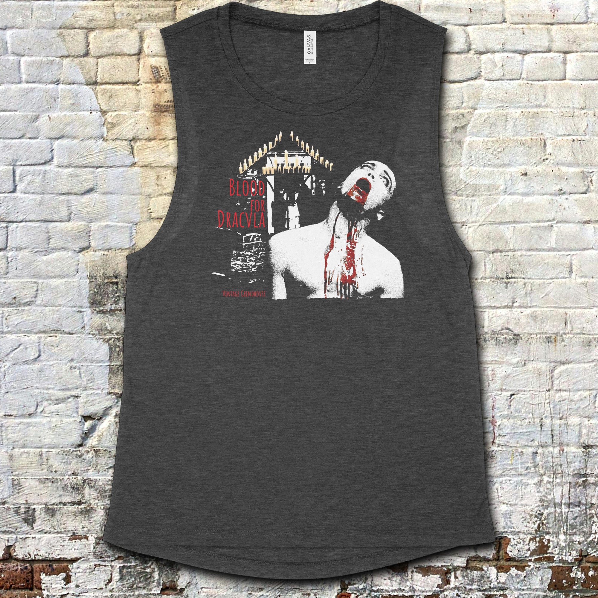 Blood for Dracula muscle tank with graphic of vampire biting neck amid gothic candlelit scene on dark fabric