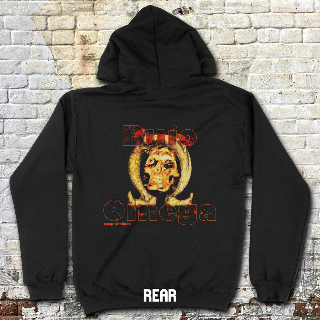Black hoodie with a graphic design on the back against a brick wall.