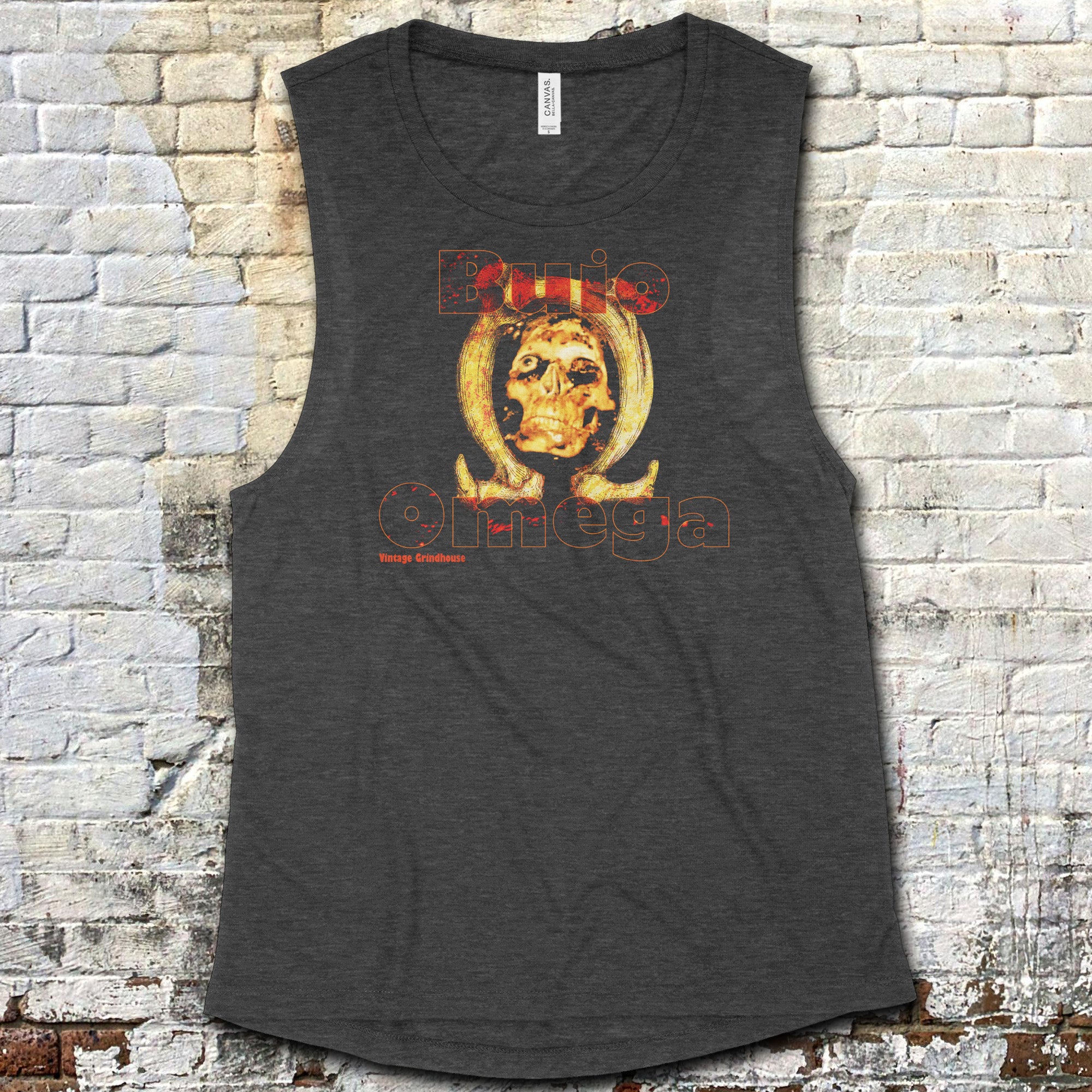 Dark gray tank top with graphic design on a textured wall background