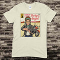 Beige t-shirt featuring a vintage comic style graphic of a woman aiming a shotgun with Bury Me an Angel text on front