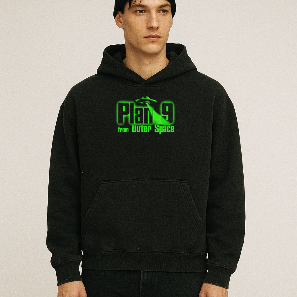 Model wearing Plan 9 from Outer Space hoodie - front and rear prints! with neon green chest graphic on black fabric
