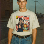 Model wearing Escape from the Bronx - Pulp Edition #5 t-shirt with vintage comic cover and action hero holding a gun