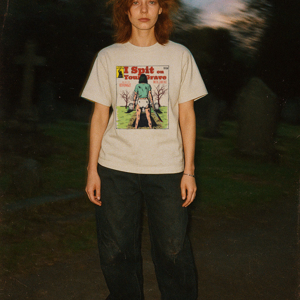 Person wearing a t-shirt with a graphic design outdoors