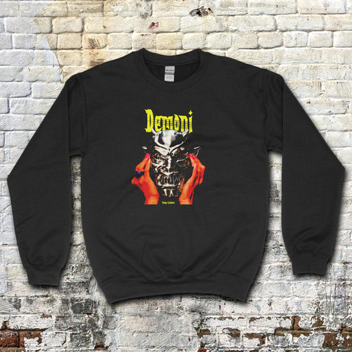 Black Demoni aka Demons sweatshirt with vivid graphic of red hands holding a silver demonic mask and yellow text