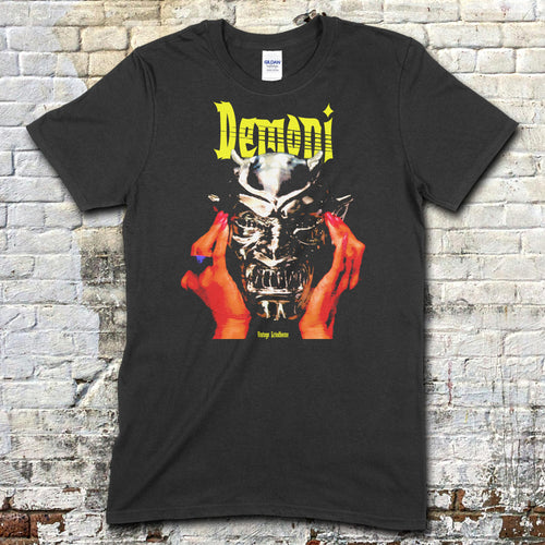 Black t-shirt featuring a graphic of hands holding a demonic silver mask with Demoni text in yellow on front