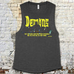 Gray tank top with yellow text against a brick wall background