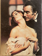 Vintage-style image of a man and woman embracing with a blurred background