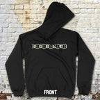 Black hoodie displaying Eraserhead - front and rear prints! with typewriter-style text on front laid flat on textured brick floor