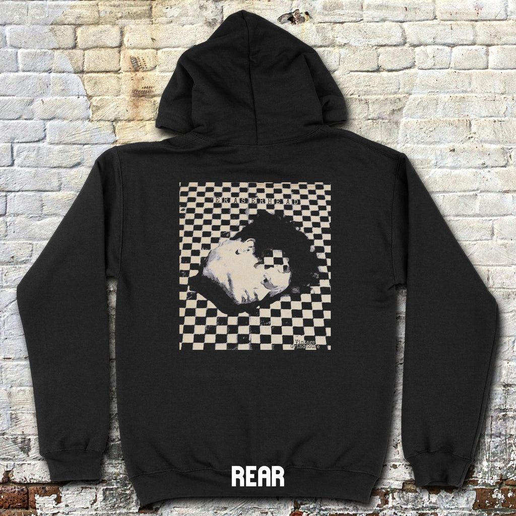 Black hoodie showing Eraserhead - front and rear prints! with distorted face graphic over checkerboard pattern on back against brick wall