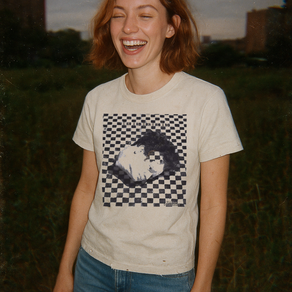 Person wearing a t-shirt with a graphic design outdoors