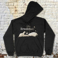 Black Eraserhead Baby hoodie with vintage film scene and bold text laid flat against rustic brick wall background