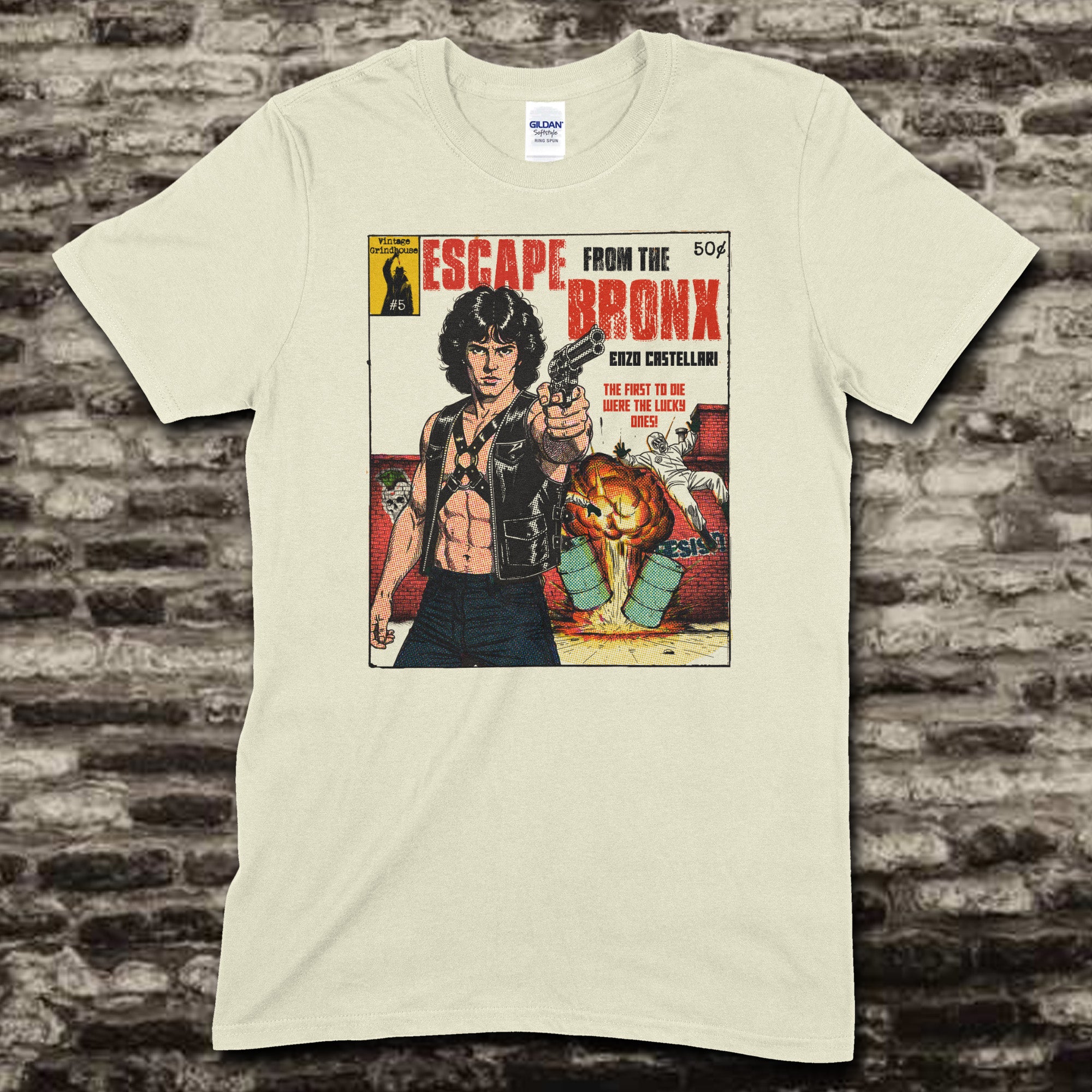Beige t-shirt featuring a vintage comic style graphic of a man holding a gun with Escape from the Bronx text on front
