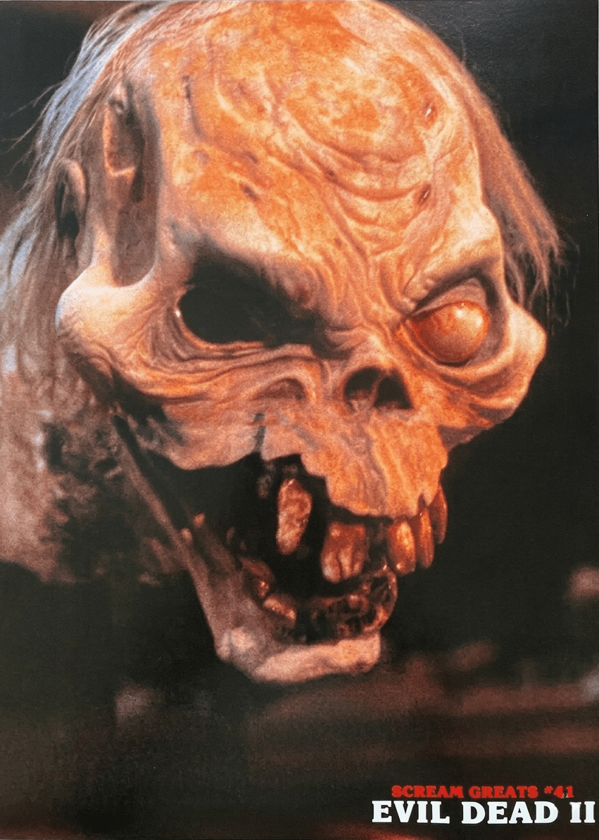 Close-up horror skull with decayed flesh and menacing expression on cover of Fangoria Magazine #66.