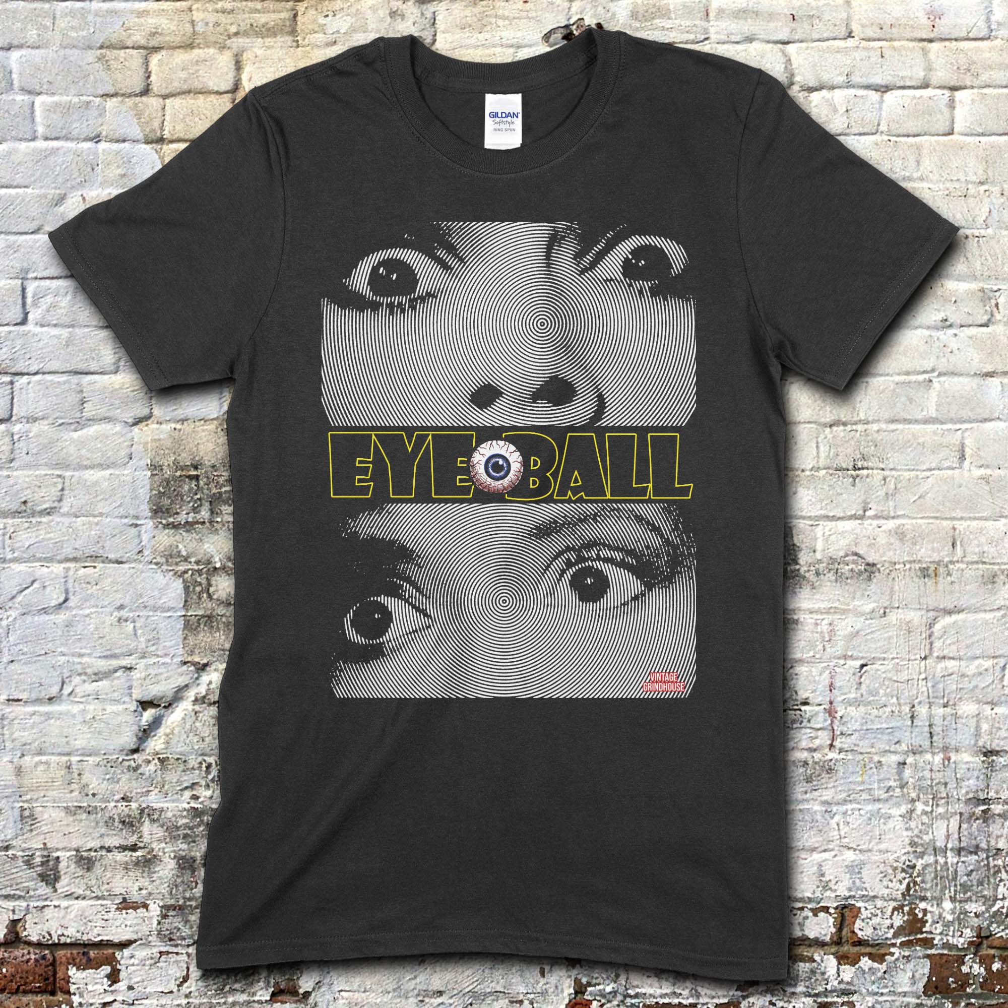Black t-shirt featuring distorted black and white close-up eyes with yellow Eyeball text and a single eyeball graphic on front