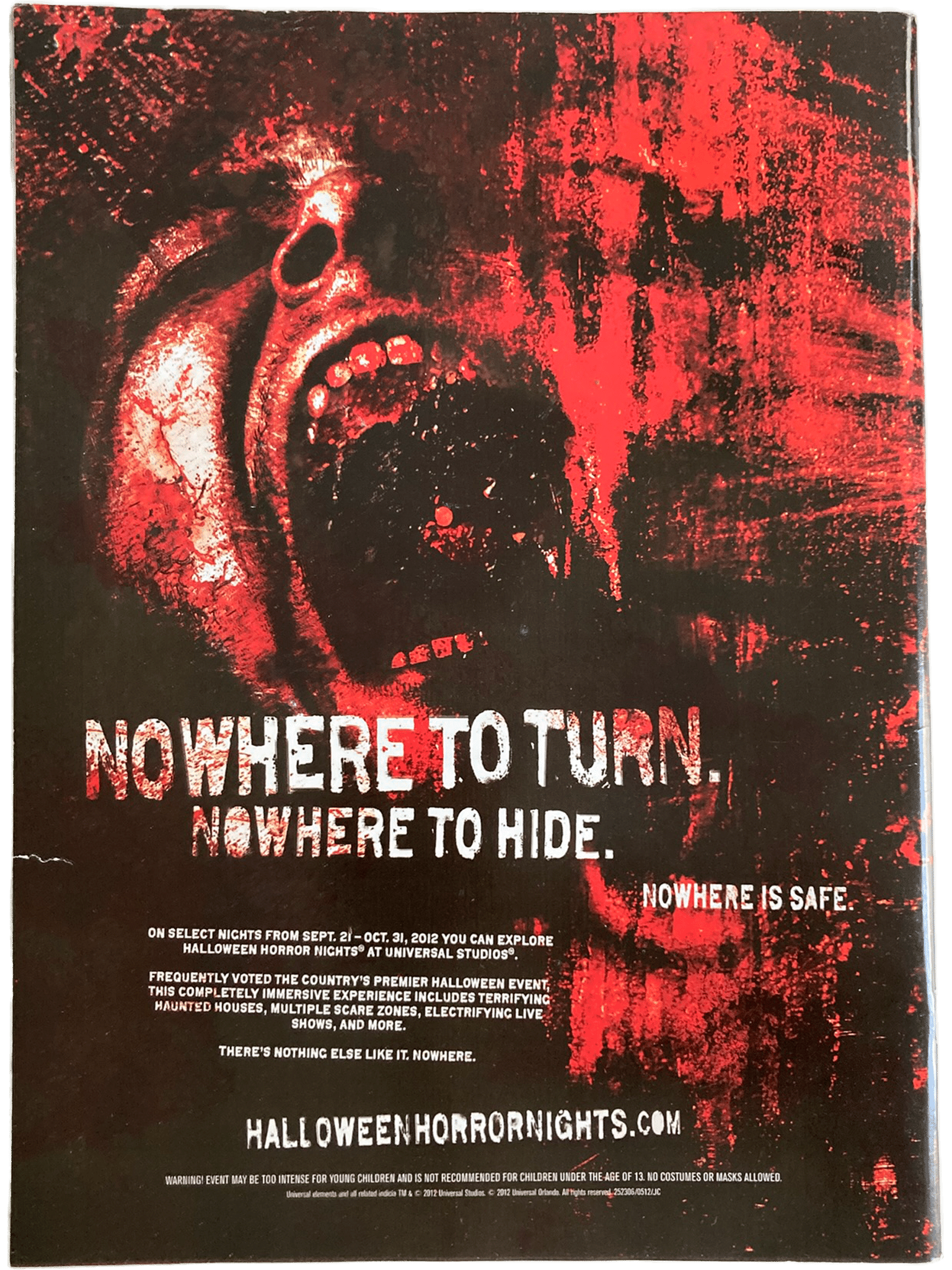 Back cover of Fangoria Magazine #316 featuring Halloween Horror Nights ad with intense red and black horror-themed design and screaming face.