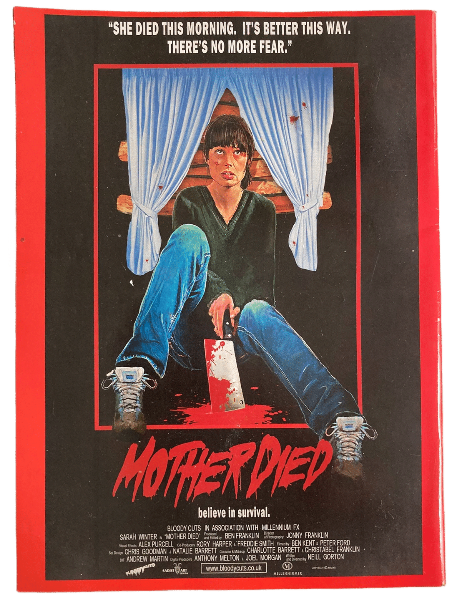 Fangoria Magazine #319 back cover art with a bloody cleaver, distressed woman, and horror quote in vintage grindhouse style