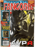 Magazine cover featuring a PredAlien from AVPR with movie posters on the left side.