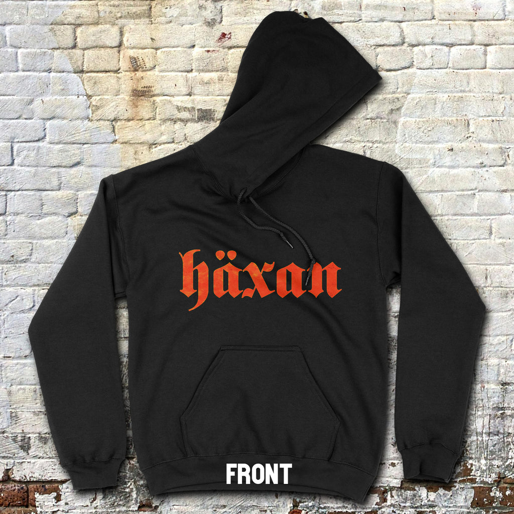 Haxan hoodie - front and rear prints! with bold orange gothic text on front displayed flat against brick wall background