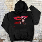 Last House on Dead End Street hoodie design featuring red lips with sharp teeth and a distressed figure in horror style