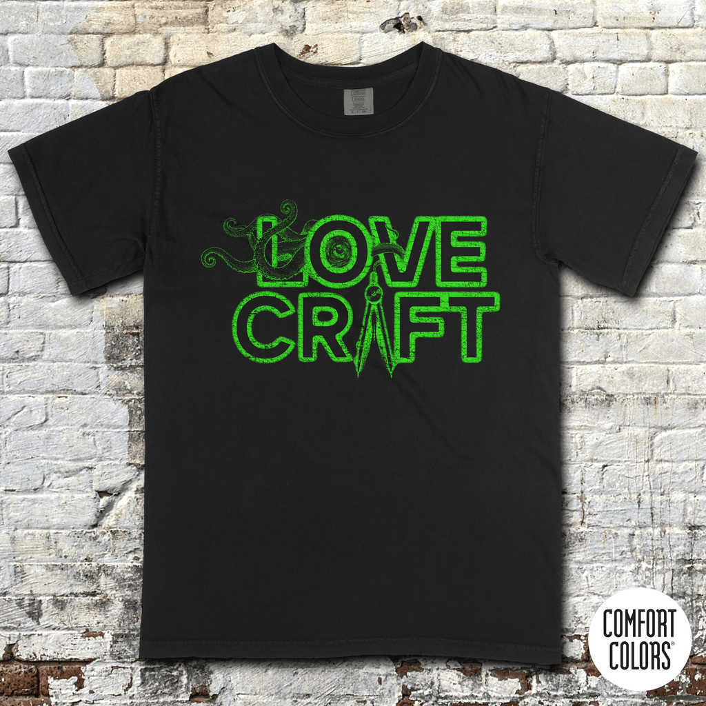 H.P. Lovecraft t-shirt with neon green text and tentacle graphic in retro style on black fabric background