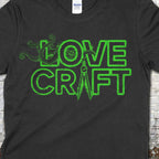 H.P. Lovecraft t-shirt in black with glowing green text featuring tentacles and an eye integrated into the design