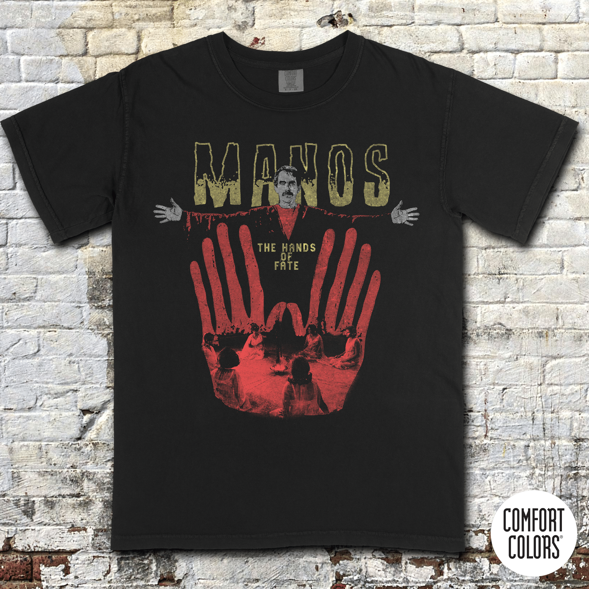 Manos - The Hands of Fate t-shirt featuring a vintage horror design with red hands and a man in black and yellow text