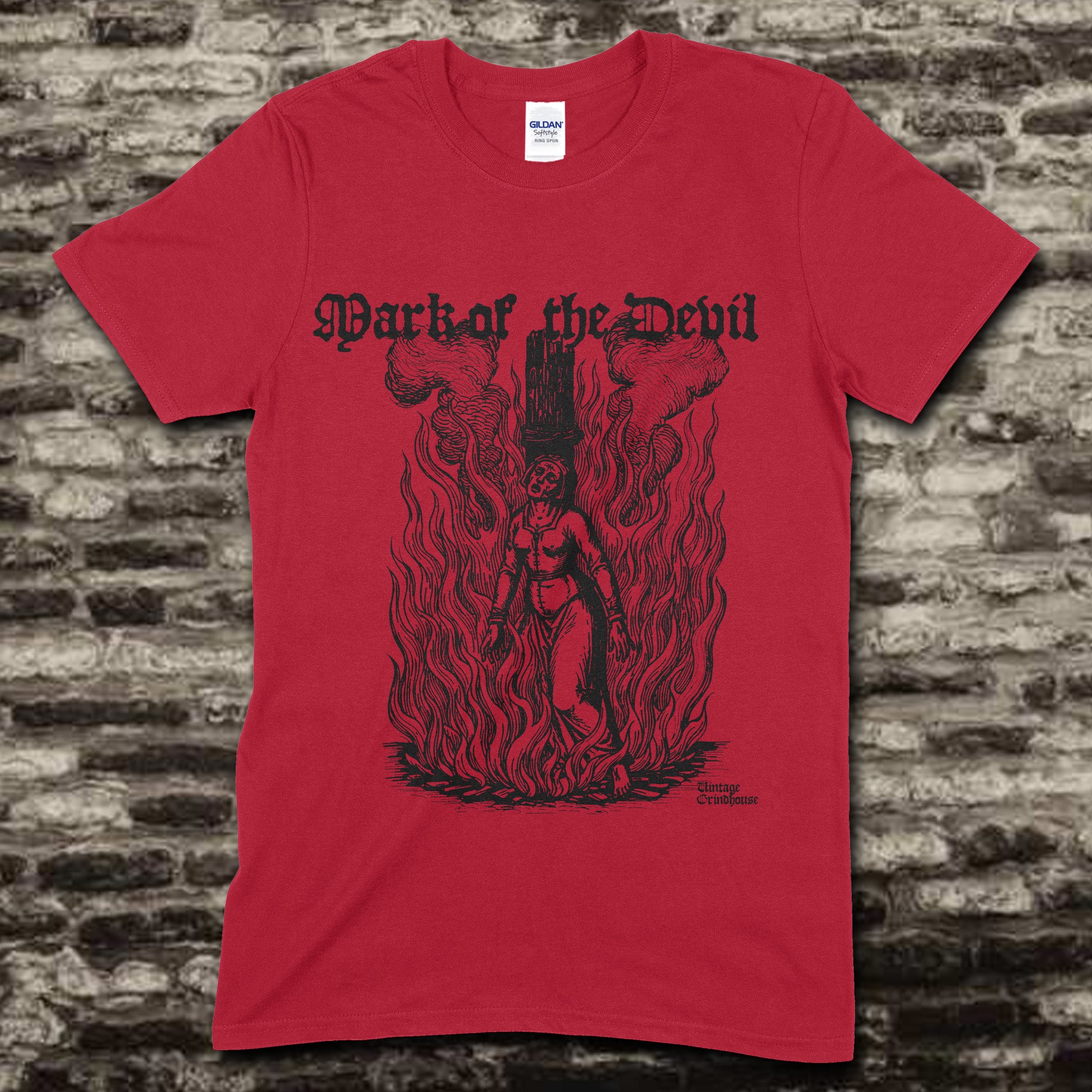 Red t-shirt with Mark of the Devil - Edition Red graphic showing vintage witch burning surrounded by flames design