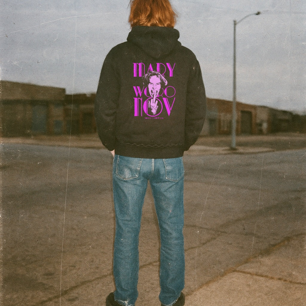 Person standing outdoors wearing Mary Woronov  hoodie - Legendary Lady of Grindhouse Cinema with purple graphic on back