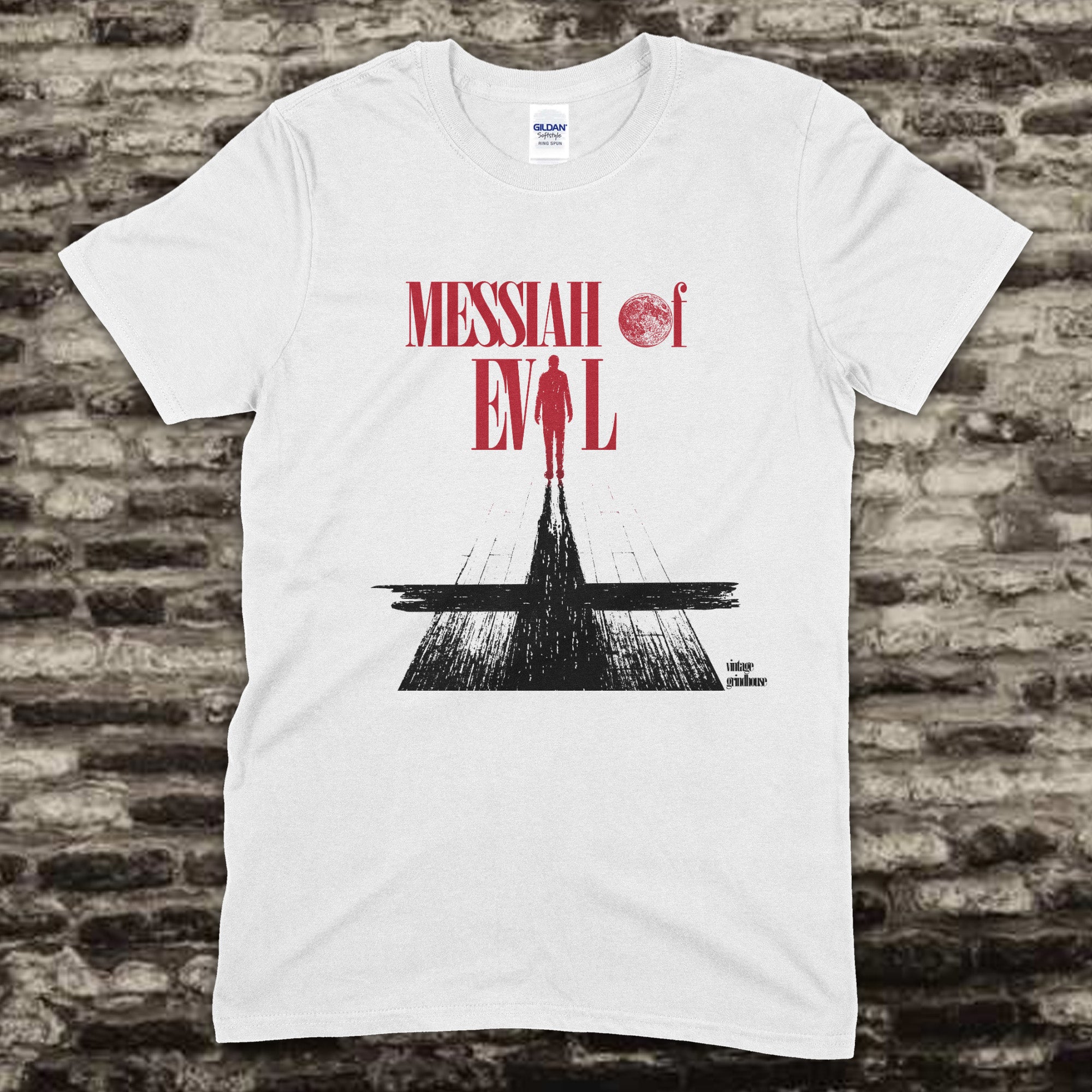 White t-shirt displaying Messiah of Evil - Blood Moon Edition text with shadowy figure and red moon graphic design