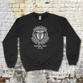 Black Miskatonic School of Medicine sweatshirt featuring a classic medical emblem with caduceus and laurel wreath design.