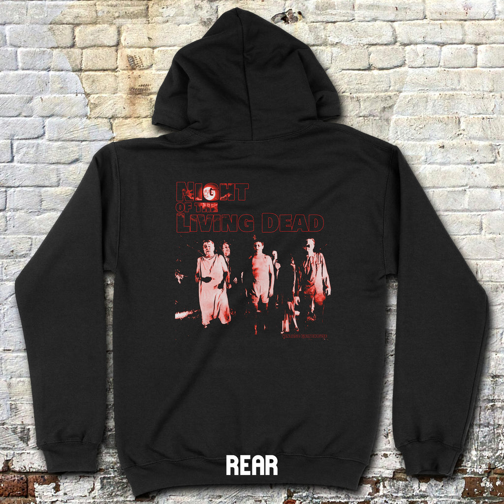Black hoodie with 'The Walking Dead' graphic on a brick wall background