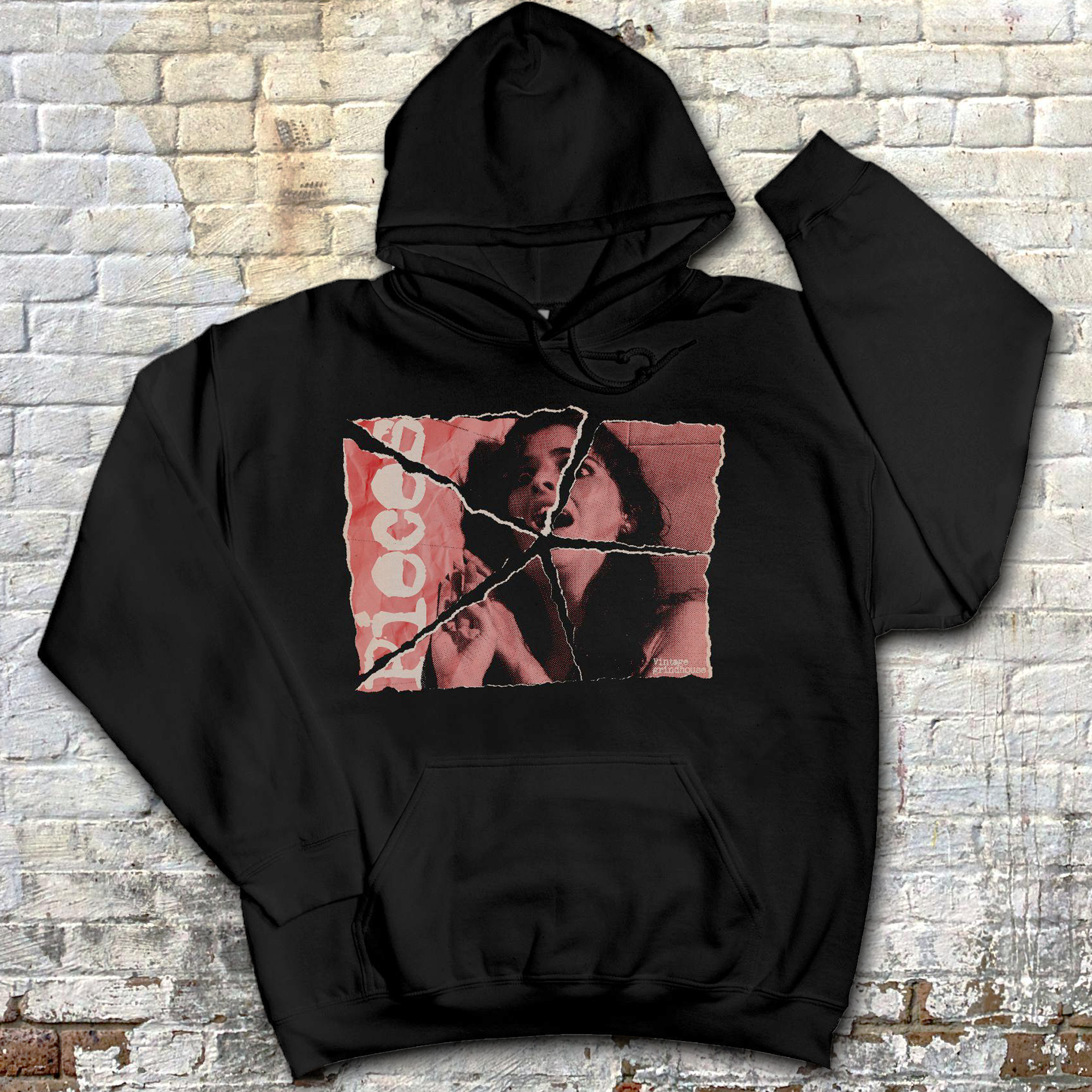 Pieces hoodie featuring a torn photo collage of a distressed figure with cracked design and bold red text on black fabric background