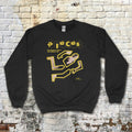 Pieces - Crime Scene Edition sweatshirt with yellow outlined crime scene graphic and stylized text on black fabric against brick wall