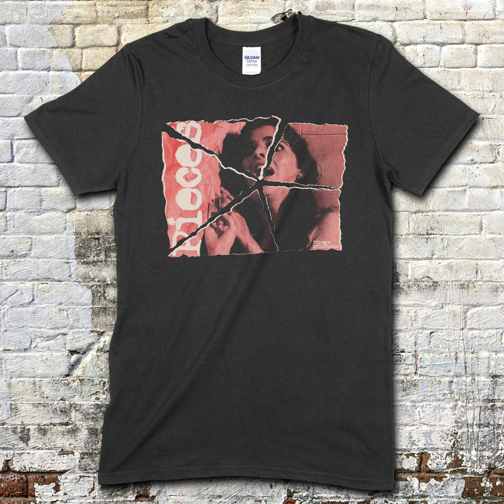 Black t-shirt featuring a torn vintage horror movie poster graphic of a man and woman with blood red text on front