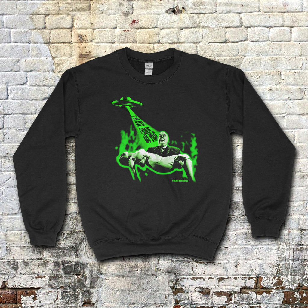 Black Plan 9 From Outer Space sweatshirt with green glowing UFO beam and man carrying woman graphic on front