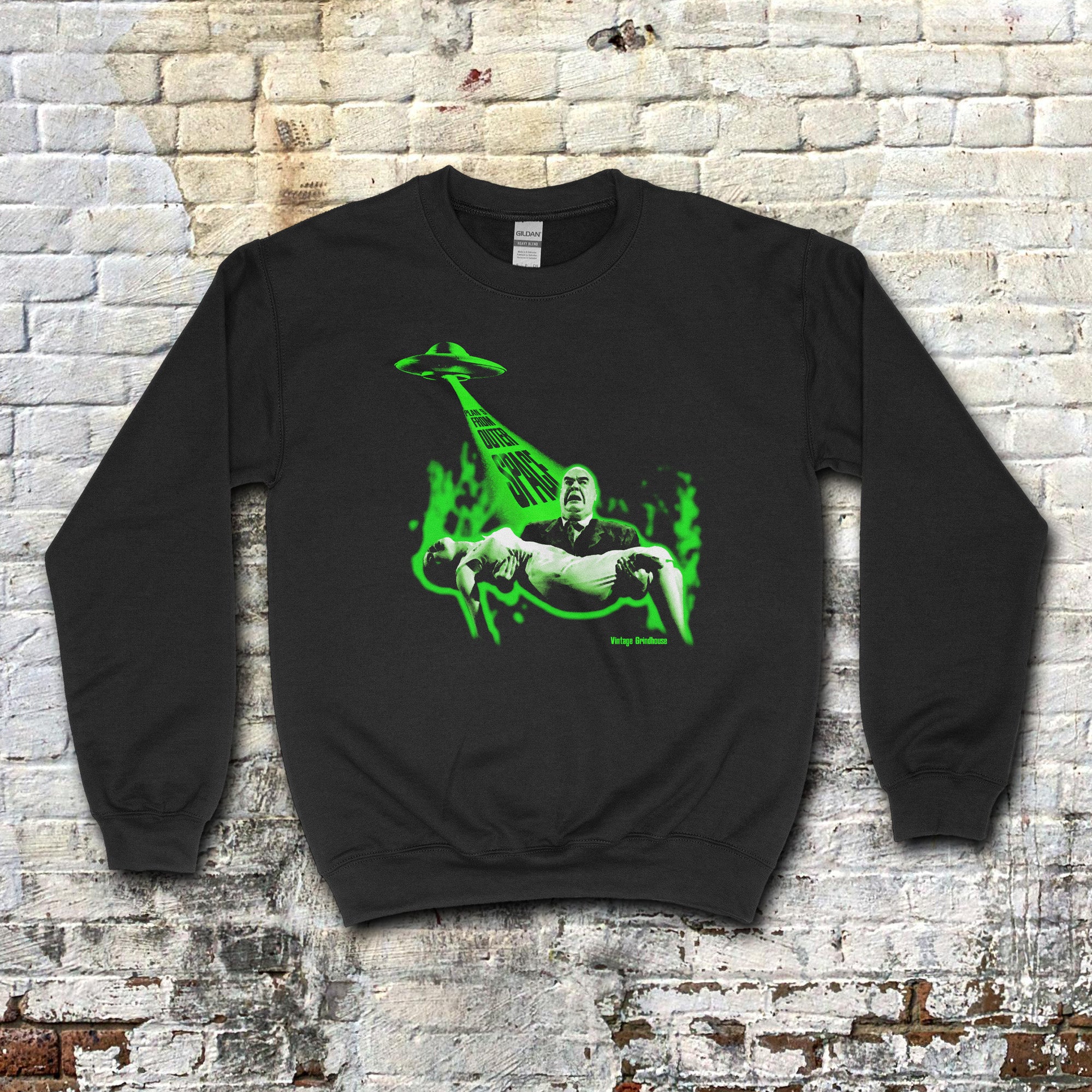 Black Plan 9 From Outer Space sweatshirt with green glowing UFO beam and man carrying woman graphic on front