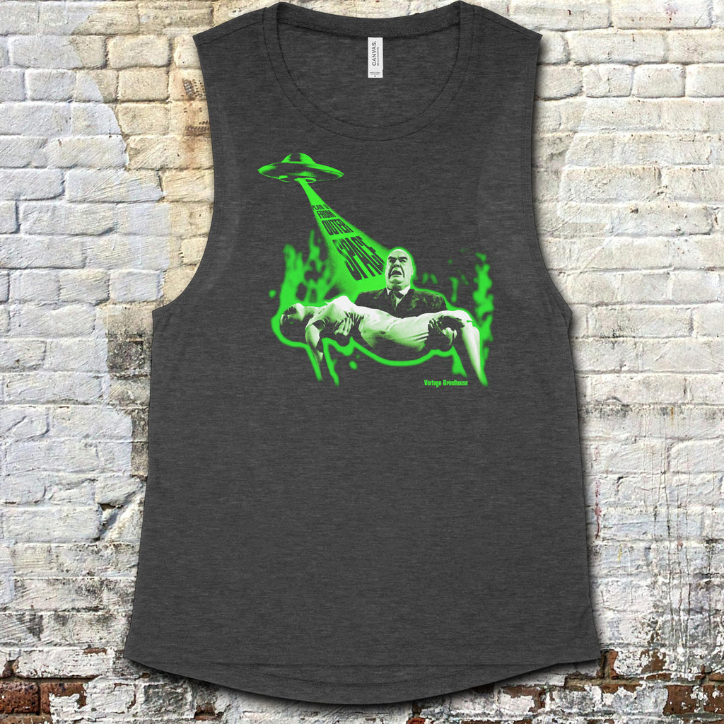 Plan 9 from Outer Space muscle tank featuring retro sci-fi graphic with alien spaceship and dramatic green glow on charcoal fabric