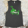 Plan 9 from Outer Space muscle tank featuring retro sci-fi graphic with alien spaceship and dramatic green glow on charcoal fabric