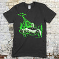 Black t-shirt featuring vintage green alien spaceship beam abducting a man holding a woman with Plan 9 from Outer Space text on front
