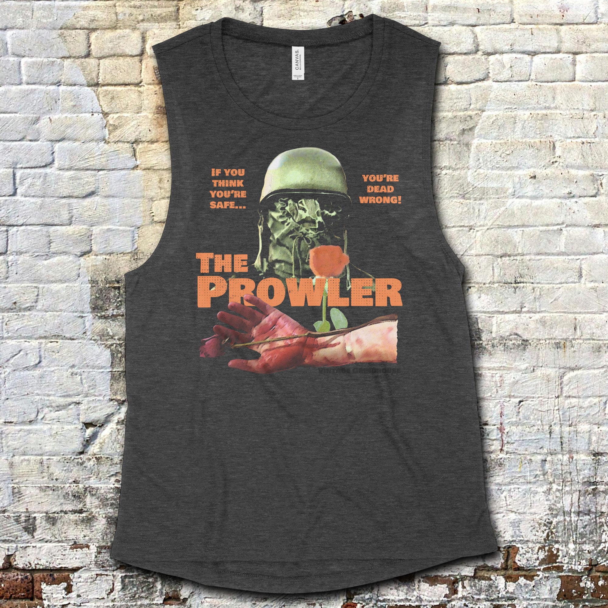 The Prowler muscle tank with graphic of skull in helmet and bloody hand holding rose on charcoal fabric background