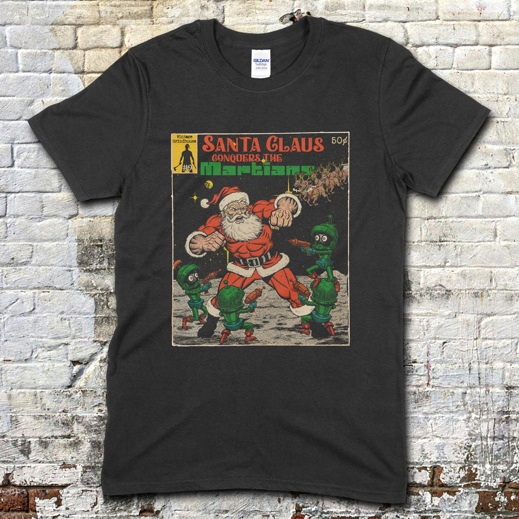 Black t-shirt with a graphic design of Santa Claus and aliens on a brick wall background