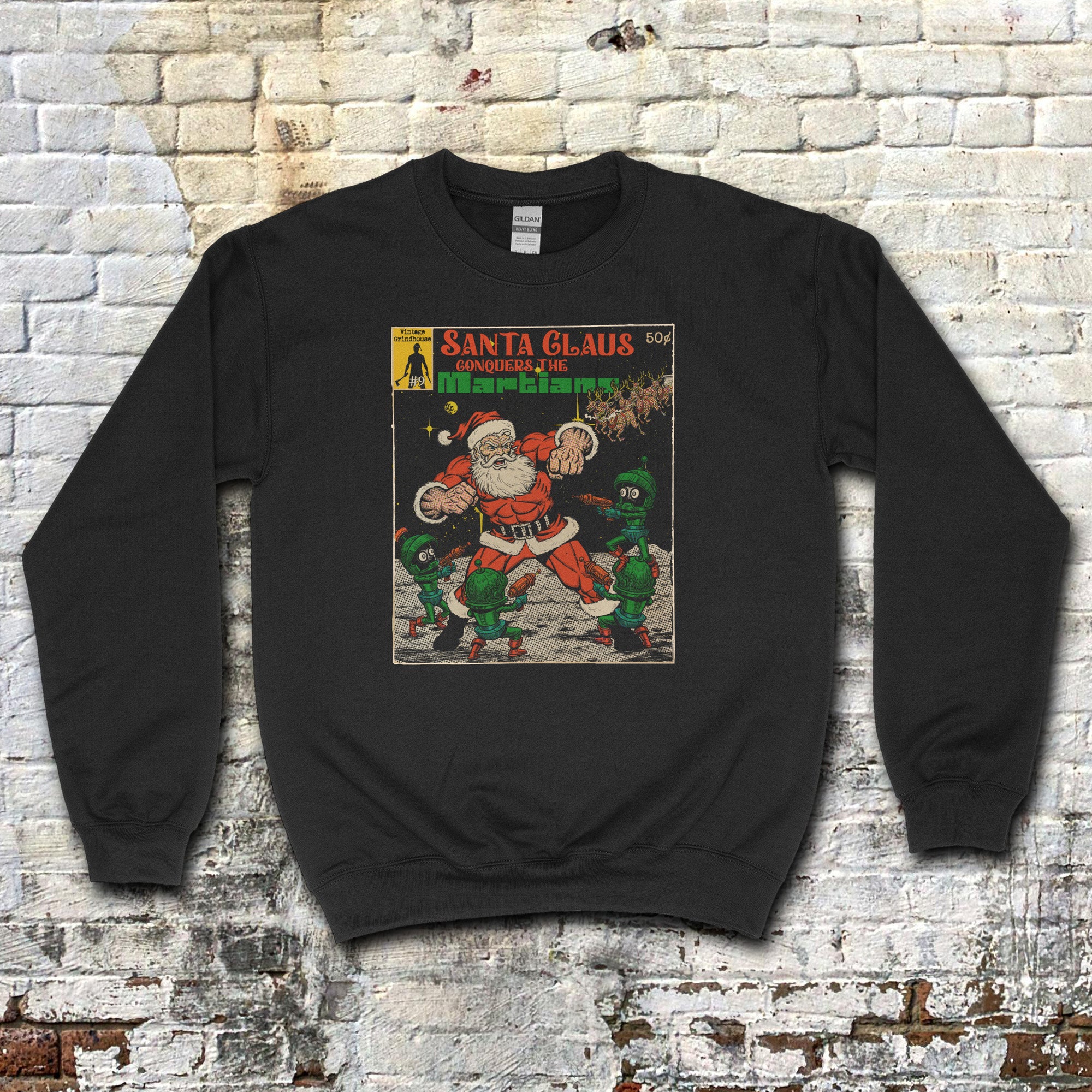 Santa Clause Conquers the Martians sweatshirt featuring vintage comic cover with Santa and green Martians on black fabric